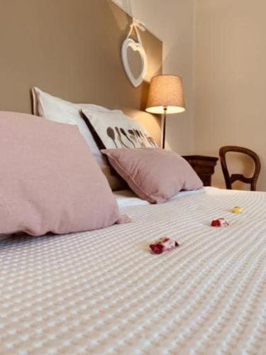Ένα ή περισσότερα κρεβάτια σε δωμάτιο στο Hôtel Restaurant La Désirade