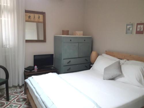 מיטה או מיטות בחדר ב-Garden House in Corfu