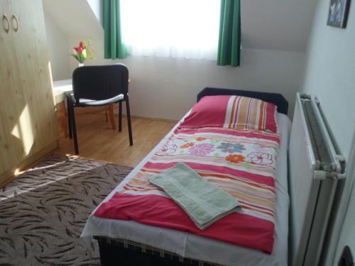 Cama o camas de una habitación en Makai Apartman