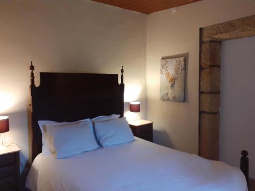 Postel nebo postele na pokoji v ubytování Casa da Vinha