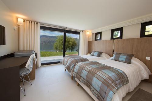 Ένα ή περισσότερα κρεβάτια σε δωμάτιο στο Villa Bagatelle - Vision Luxe