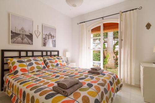 Postel nebo postele na pokoji v ubytování Casa Corazon Burriana Casasol