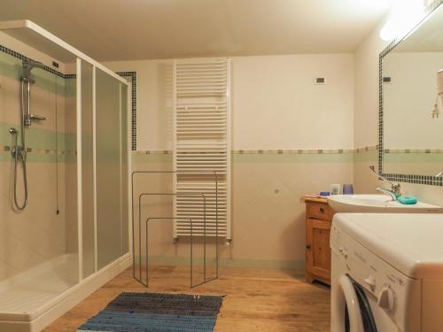 a bathroom with a shower and a sink at Casa Cristina in Campitello di Fassa