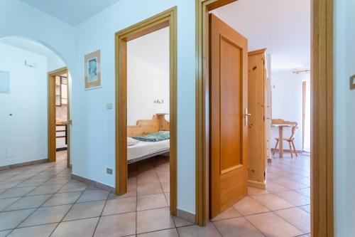 Ένα ή περισσότερα κρεβάτια σε δωμάτιο στο Casa Fanton