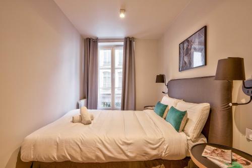 Krevet ili kreveti u jedinici u okviru objekta 02 - Urban Exclusive in Montorgueil