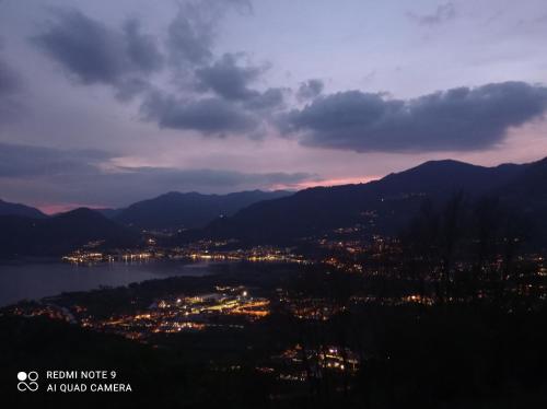a view of a city and a body of water at CASA DELLE API in Pisogne