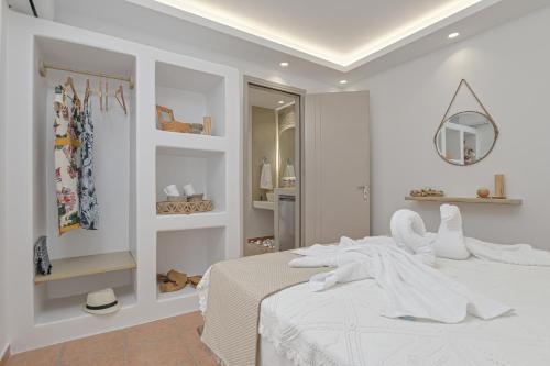 A bed or beds in a room at Felicite apartments Naxos