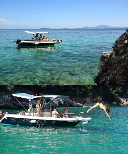 a group of people on a boat in the water at Amalia Complex in Nisakion