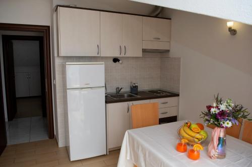 Kuchyňa alebo kuchynka v ubytovaní Sara Apartments