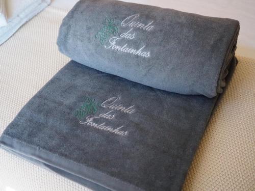 two pillows sitting on top of a table at Quinta das Fontainhas in Mesão Frio