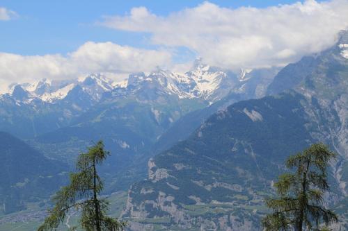 a view of a mountain range with snow capped mountains at Mélèzes S 023- SKI LIFT apartment 6 pers in Veysonnaz
