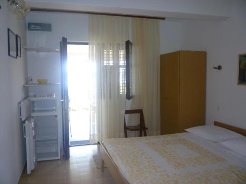 Posteľ alebo postele v izbe v ubytovaní Apartment in Pisak with sea view, terrace, air conditioning, Wi-Fi (4722-1)