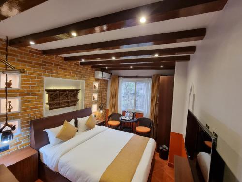 Postel nebo postele na pokoji v ubytování Chautari Boutique Hotel
