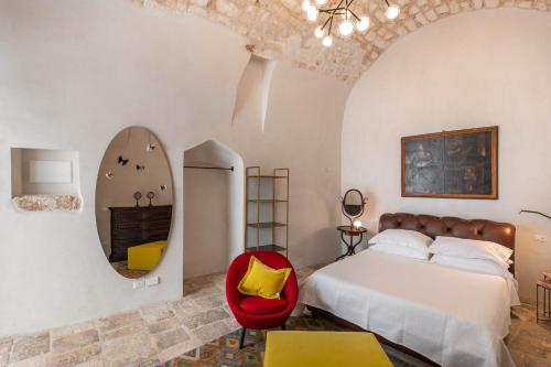 En eller flere senge i et værelse på Il Sogno delle Benedettine