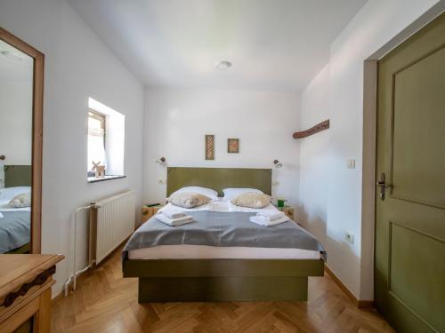 Berghi Hotel and Apartmentsにあるベッド