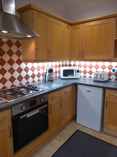 Η κουζίνα ή μικρή κουζίνα στο Middlethorpe Apartment