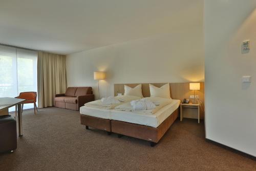 Postel nebo postele na pokoji v ubytování Ardey Hotel