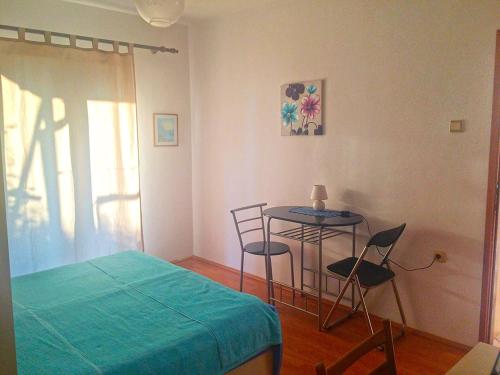 Postel nebo postele na pokoji v ubytování Studio Apartment in Lopar with Terrace, Air Conditioning, Wi-Fi (4842-1)