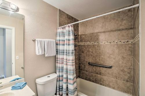 a bathroom with a shower and a toilet at Modern North Port Gem Near Beaches, Golf, and Shops! in North Port