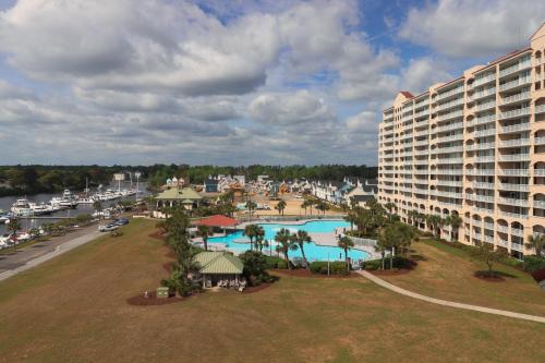 an aerial view of a resort with a large pool at Yacht Club Villas #1-701 condo in Myrtle Beach