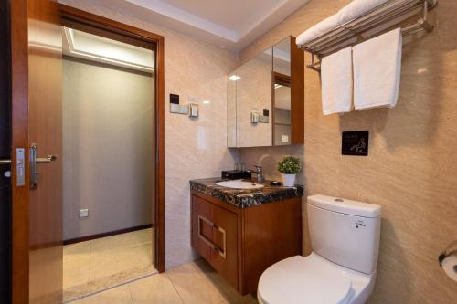 Kitchen o kitchenette sa Foshan Poltton International Serviced Apartment