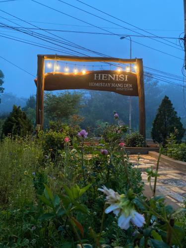 a sign for the entrance to a flower garden at HeniSi Homestay Măng Đen Villa in Kon Von Kla