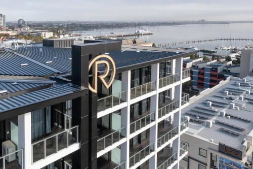 a building with the letter r on top of it at R Hotel Geelong in Geelong