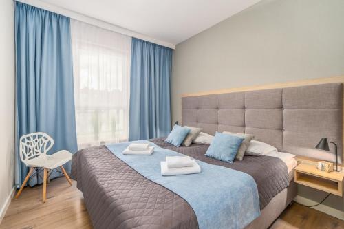 Postel nebo postele na pokoji v ubytování Bel Mare Resort Apartment with Parking by Renters