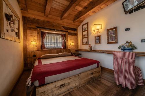 מיטה או מיטות בחדר ב-Hotel Della Nouva