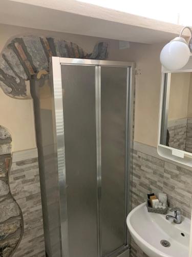 a bathroom with a shower and a sink at A pochi passi dal mare in Monterosso al Mare