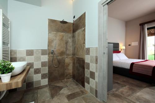 Postel nebo postele na pokoji v ubytování Perugia Vecchia Relais