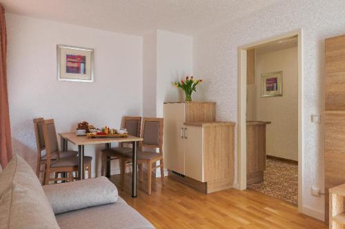 Posezení v ubytování Edelweiß - Appartements & Café