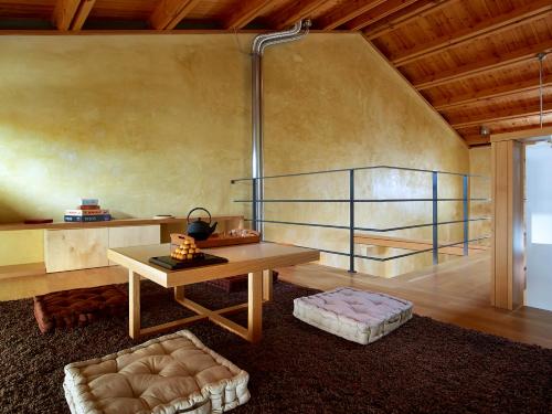 a living room with a table and a couch at Dorotheou House in Chania
