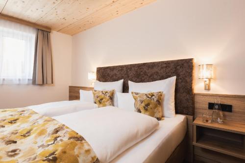 Postel nebo postele na pokoji v ubytování S'Kathrina - Appartements