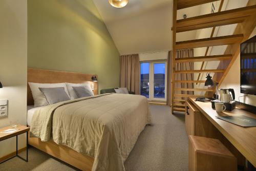 Postel nebo postele na pokoji v ubytování Hotel Element