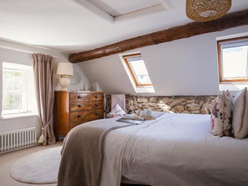 Voodi või voodid majutusasutuse Walkley Wood Cottage toas