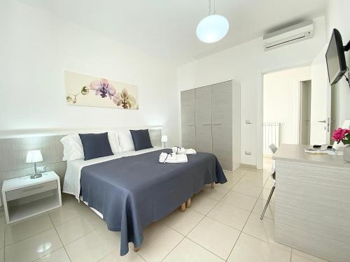 A bed or beds in a room at B&B ARFE'