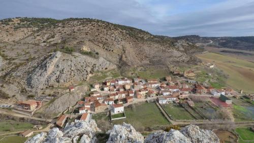 an aerial view of a village on a mountain at Las Aliagas Apartamentos Rurales in Megina