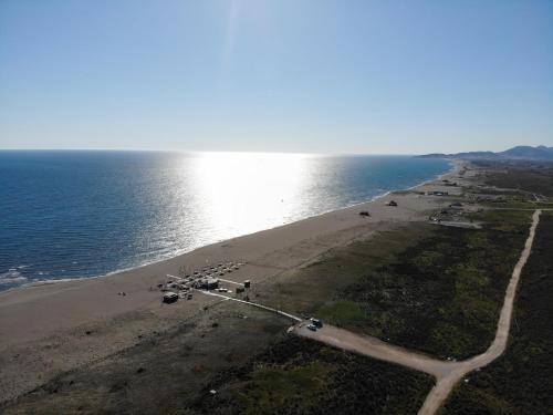 an aerial view of a beach and the ocean at Hotel Freiburg in Ulcinj