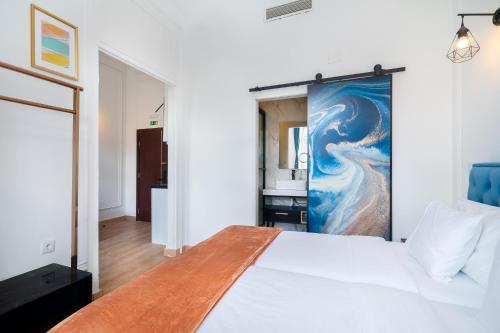Postel nebo postele na pokoji v ubytování Lisbon 5 Hotel