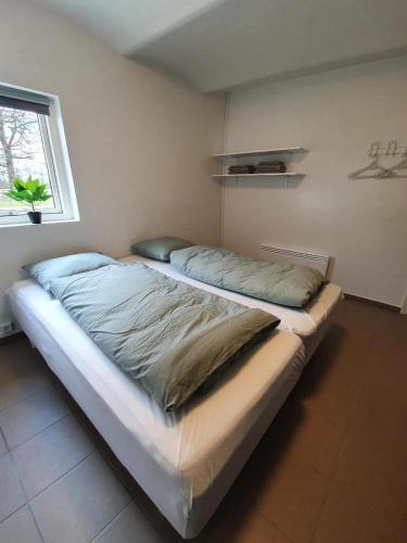 Postel nebo postele na pokoji v ubytování På landet