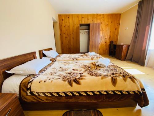 Postel nebo postele na pokoji v ubytování Guesthouse AlpenRose