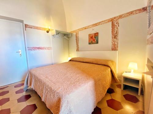 Ein Bett oder Betten in einem Zimmer der Unterkunft Porto Salvo