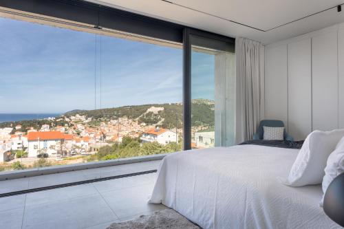 Posteľ alebo postele v izbe v ubytovaní Infinity Residence