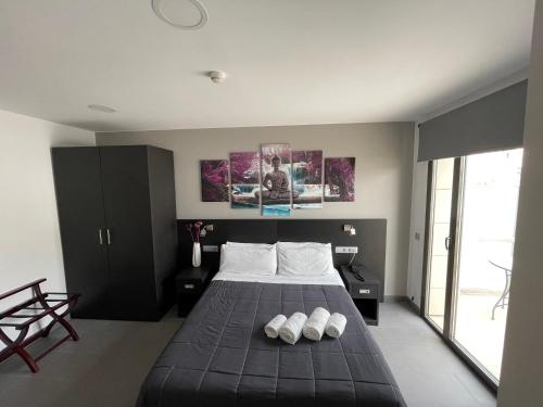 Posteľ alebo postele v izbe v ubytovaní 6 Bis HOTEL