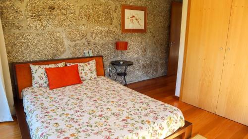 Postel nebo postele na pokoji v ubytování Eira House - Quinta de Fundevila