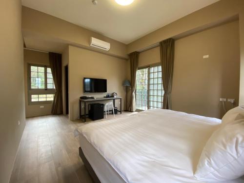 Sitou ARCADIA Homestayにあるテレビまたはエンターテインメントセンター