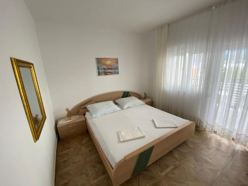 Postel nebo postele na pokoji v ubytování Villa Janja