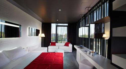Postel nebo postele na pokoji v ubytování San Ranieri Hotel