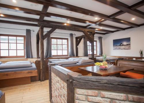 a living room with couches and a table at Piste und Pedale , Deine Bude-Dein Abenteuer in Winterberg